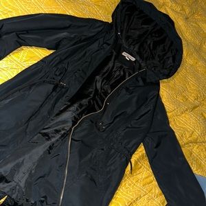 Mid length black rain coat